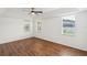 Spacious bedroom with wood floors and large windows at 4901 Culdesac Ct, St Cloud, FL 34772