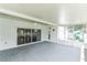 Spacious screened patio with ceiling fan at 4901 Culdesac Ct, St Cloud, FL 34772