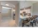Modern kitchen with breakfast bar and stainless steel appliances at 7509 Seven Eagles Way, Reunion, FL 34747
