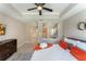 Main bedroom with king-size bed and open bathroom with a walk-in shower at 7509 Seven Eagles Way, Reunion, FL 34747