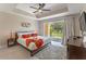 Main bedroom with king-size bed and access to a private patio at 7509 Seven Eagles Way, Reunion, FL 34747