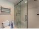 Bathroom with a frameless glass shower at 7509 Seven Eagles Way, Reunion, FL 34747