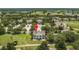 Aerial view showcasing home location within community near golf course at 7509 Seven Eagles Way, Reunion, FL 34747