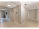 Clean hallway with tile floors and access to other rooms at 7509 Seven Eagles Way, Reunion, FL 34747