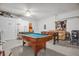 Game room with pool table and foosball table at 195 Hideaway Beach Ln, Kissimmee, FL 34746