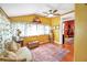 Charming sunroom offering a tranquil seating area and hardwood floors at 2301 Ne 97Th Street Rd, Anthony, FL 32617