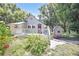 Charming house exterior with a deck and a shed in the backyard at 2301 Ne 97Th Street Rd, Anthony, FL 32617