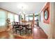 Elegant dining room with hardwood floors and a formal dining table at 2301 Ne 97Th Street Rd, Anthony, FL 32617