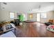 Large living room with hardwood floors and lots of natural light at 2301 Ne 97Th Street Rd, Anthony, FL 32617