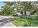 Front view of the house, with a car parked in the driveway at 2301 Ne 97Th Street Rd, Anthony, FL 32617