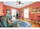 Cozy living room with leather sofa and hardwood floors at 2301 Ne 97Th Street Rd, Anthony, FL 32617