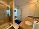 Bathroom features granite countertops, dual sinks, and a glass-enclosed shower at 155 S Court Ave # 1801, Orlando, FL 32801