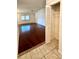 Hardwood floor living room with access to closet at 4901 Pleasant Hollow Trl, Lakeland, FL 33811