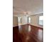 Spacious main bedroom with hardwood floors and ceiling fan at 4901 Pleasant Hollow Trl, Lakeland, FL 33811