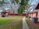 Backyard with picnic tables and grill area at 2860 N Powers Dr # 133, Orlando, FL 32818