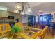 Bright dining area with glass-top table and wicker chairs at 2301 S Atlantic Ave # 327, Daytona Beach, FL 32118