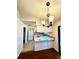 Kitchen with white cabinets and breakfast bar at 4901 Pleasant Hollow Trl, Lakeland, FL 33811