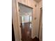 View of bedroom with hardwood floors and access to bathroom at 4901 Pleasant Hollow Trl, Lakeland, FL 33811