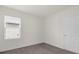 Simple bedroom with neutral walls and carpeted flooring at 957 King Parc Rd, Orange City, FL 32763