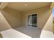Covered patio with sliding glass door at 957 King Parc Rd, Orange City, FL 32763