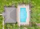 Directly above photo of a community pool with lounge chairs and a clubhouse at 957 King Parc Rd, Orange City, FL 32763