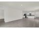Spacious living room with tile flooring and neutral walls at 957 King Parc Rd, Orange City, FL 32763