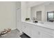 Elegant bathroom with double vanity, and plenty of counter space at 875 Ocean Course Ave, Davenport, FL 33896