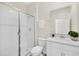 Clean bathroom, featuring a shower and vanity with a quartz countertop at 875 Ocean Course Ave, Davenport, FL 33896