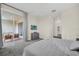 Main bedroom with access to a private balcony and en suite bathroom at 875 Ocean Course Ave, Davenport, FL 33896