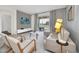 Modern living room with light walls and patio access at 875 Ocean Course Ave, Davenport, FL 33896