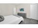Well-lit bedroom with a queen-size bed and ample closet space at 875 Ocean Course Ave, Davenport, FL 33896