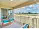 Spacious screened lanai offering stunning golf course views at 875 Ocean Course Ave, Davenport, FL 33896