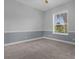 Spacious bedroom with neutral walls and carpet at 12908 Creekside Ct, Clermont, FL 34711