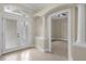 Bright and spacious entryway with tile flooring and double doors at 12908 Creekside Ct, Clermont, FL 34711