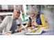 Couple enjoying a meal at an outdoor restaurant at 1701 Andover Ridge Dr, Deland, FL 32720