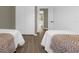 Guest bedroom with two beds and closet at 1121 Park Ridge Cir, Kissimmee, FL 34746