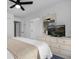 Bright bedroom with a comfy bed and TV at 1121 Park Ridge Cir, Kissimmee, FL 34746