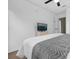 Main bedroom with a TV and dresser at 1121 Park Ridge Cir, Kissimmee, FL 34746