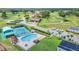 Community pool, basketball court and parking area at 26841 Bella Vista Dr, Howey In The Hills, FL 34737