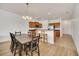 Dining room with a table and chairs adjacent to the kitchen at 26841 Bella Vista Dr, Howey In The Hills, FL 34737