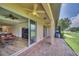 Spacious patio with brick pavers, overlooking a golf course at 26841 Bella Vista Dr, Howey In The Hills, FL 34737