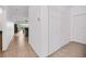 Bright hallway with tile floors and access to multiple rooms at 26841 Bella Vista Dr, Howey In The Hills, FL 34737