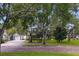 Home with a brick driveway and lush landscaping at 731 Midget Dr, Winter Park, FL 32789