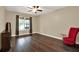 Spacious bedroom with dark hardwood floors and plenty of natural light at 5209 Villa Rosa Ave, Saint Cloud, FL 34771