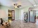 Relaxing living room with tiled floors, a ceiling fan, and French doors at 610 S Laurel Ave, Sanford, FL 32771