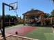 Outdoor space with basketball court, seating, and grills at 7601 Canada Ave # 605, Orlando, FL 32819