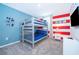 bedroom with bunk beds and Mickey Mouse decor at 951 Splash Shot Pl # 0, Davenport, FL 33896