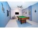 Basement game room with pool table and seating area at 951 Splash Shot Pl # 0, Davenport, FL 33896