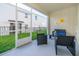 Relaxing screened porch with seating and yard views at 951 Splash Shot Pl # 0, Davenport, FL 33896