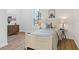 Cozy bedroom with twin bed, window, and wood-look flooring at 6979 Big Bend Dr, St Cloud, FL 34771